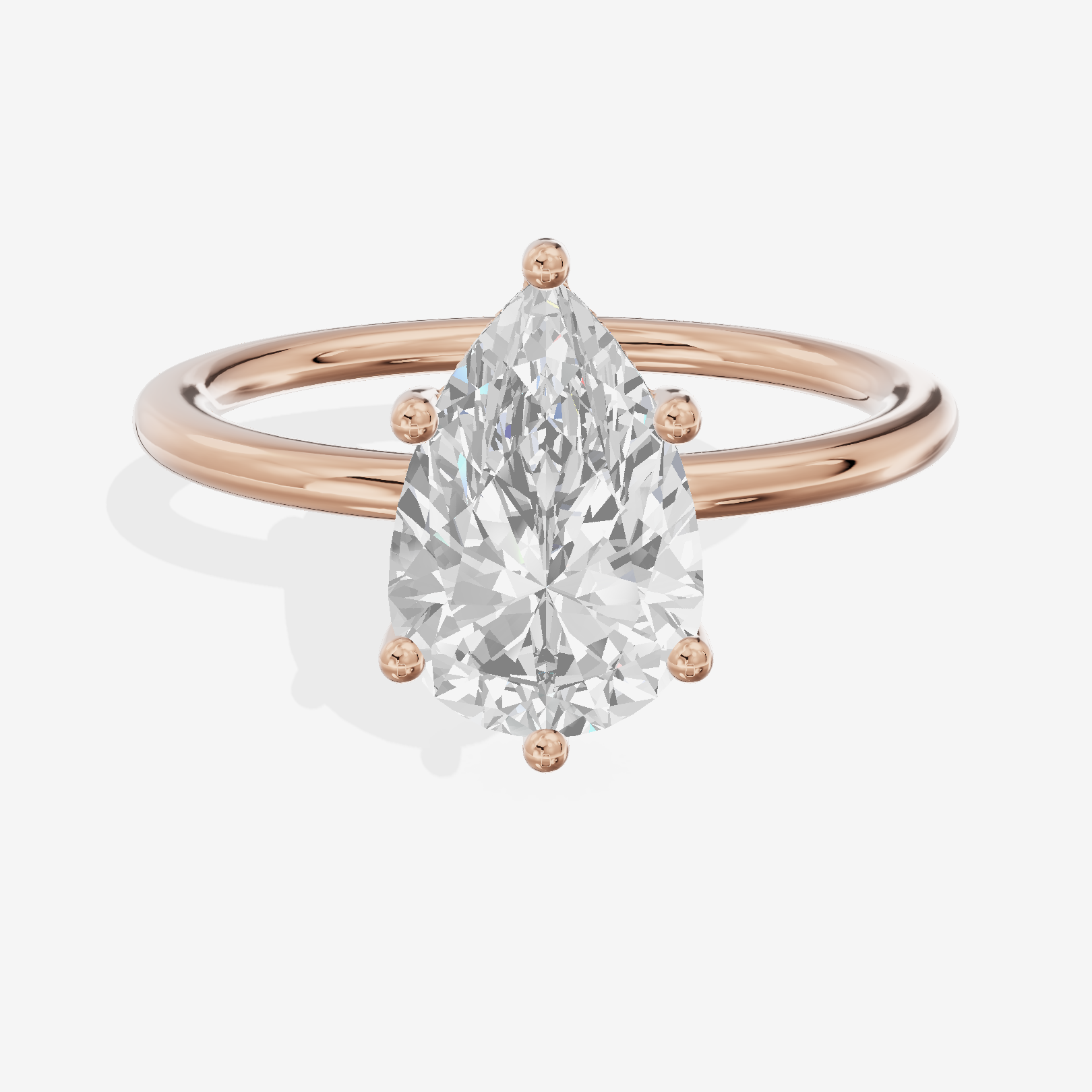 Reverya Hidden Halo Pear Engagement Ring (1/20 ct. tw.) in 18K Rose Gold