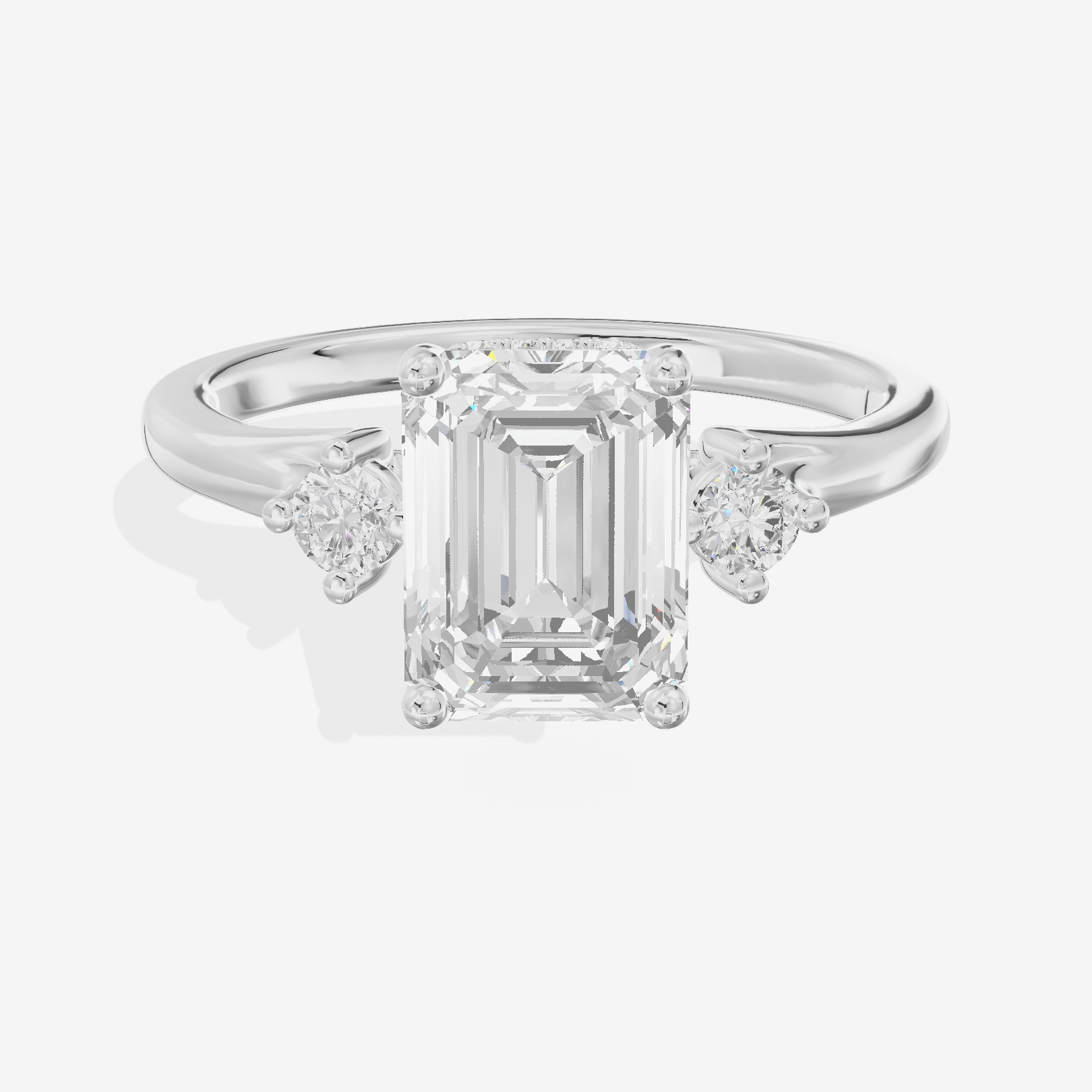 Sincere Three Stone Emerald Engagement Ring (1/6 ct. tw.) in 14K White Gold