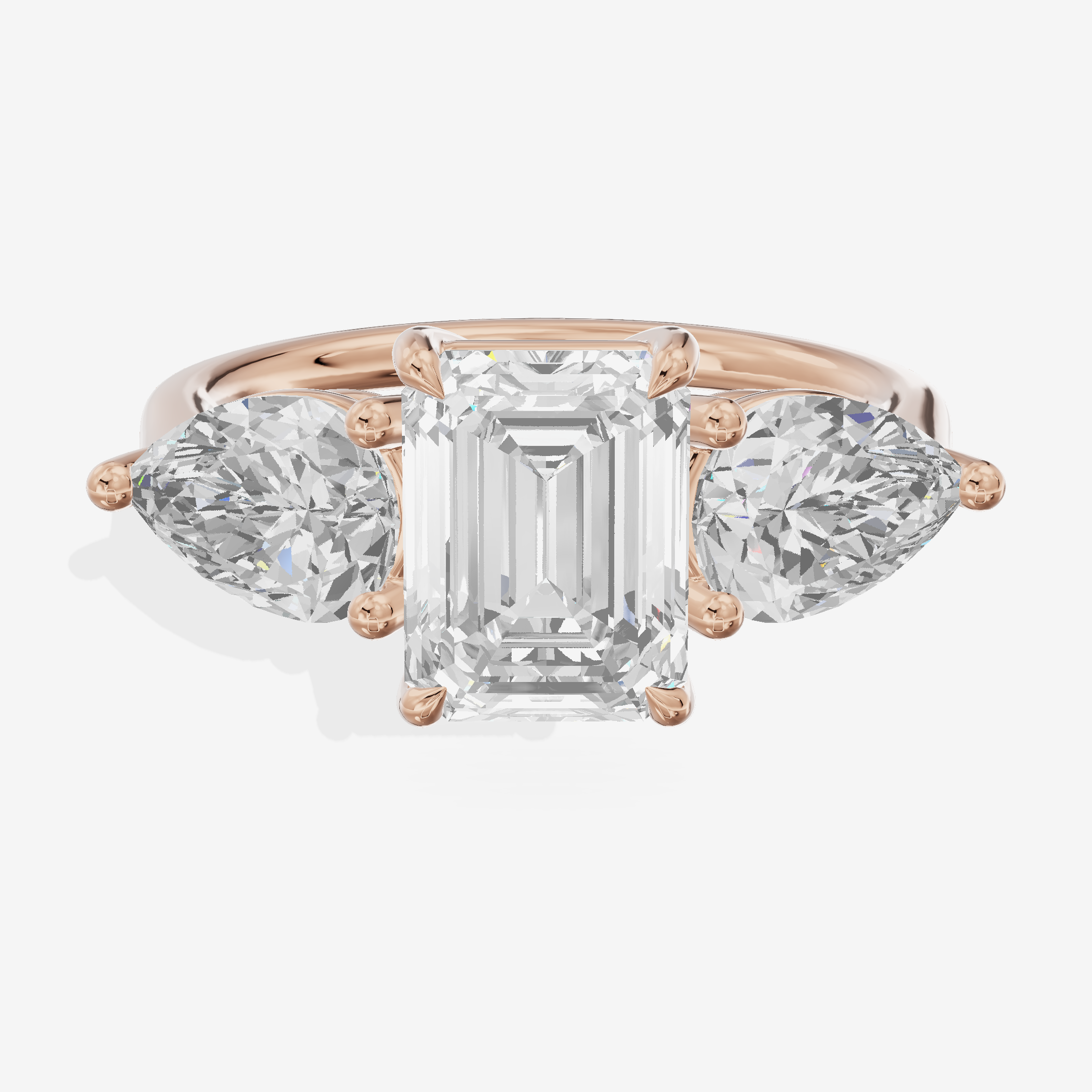 Luxe Heartline Three Stone Emerald Engagement Ring (3/4 ct. tw.) in 18K Rose Gold