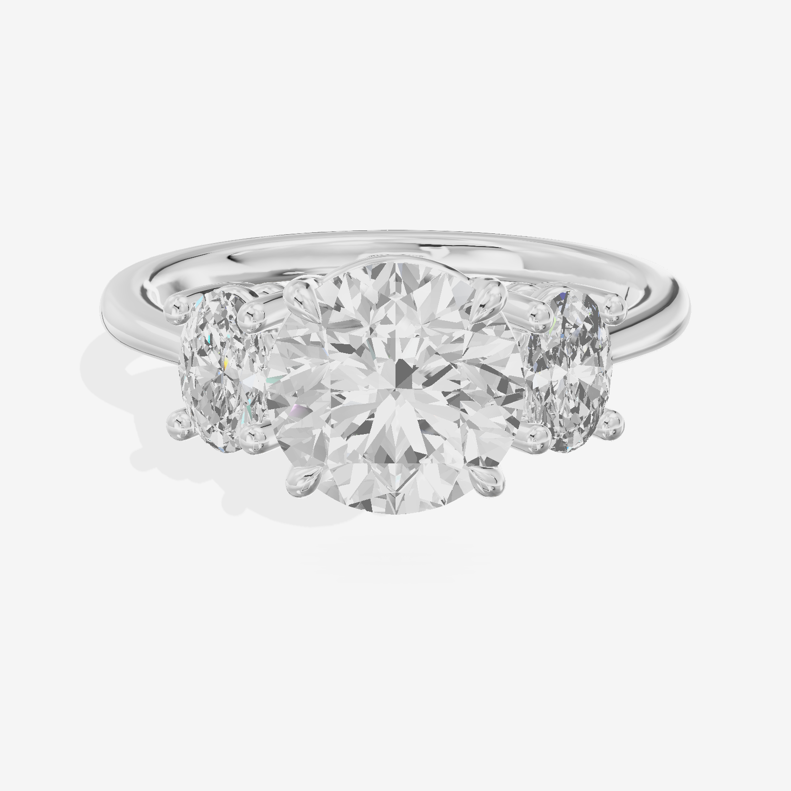 Modern Coeurine Three Stone Round Engagement Ring (1/2 ct. tw.) in 18K White Gold