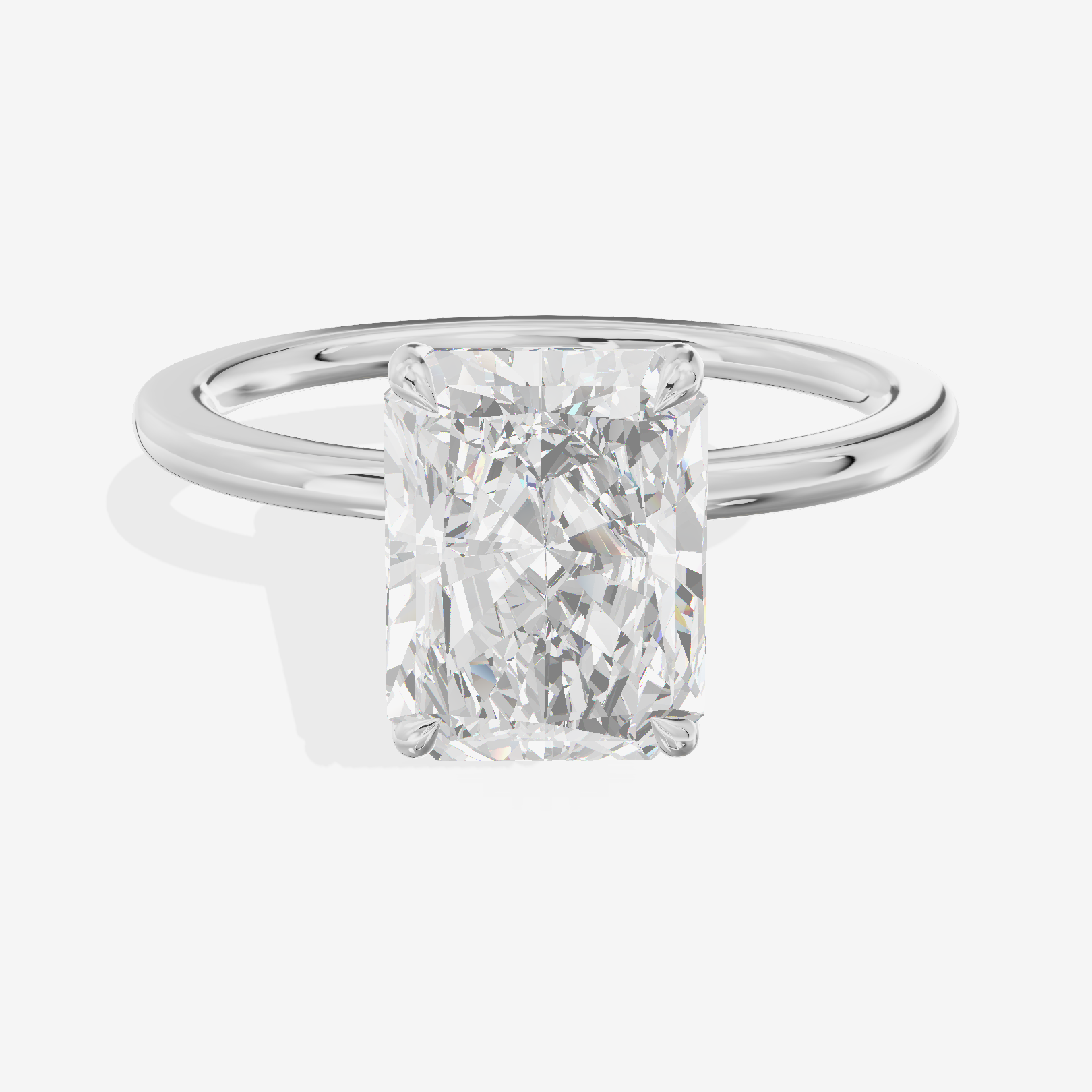 Coeurine Hidden Halo Radiant Engagement Ring (1/20 ct. tw.) in 14K White Gold