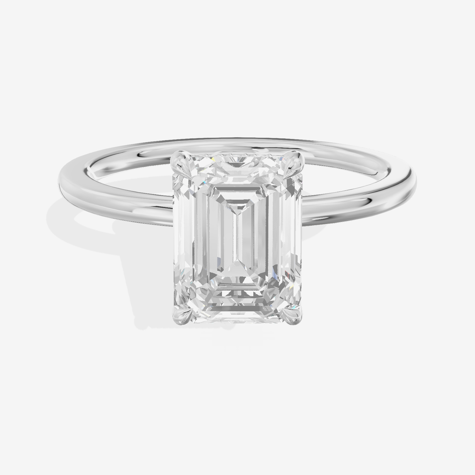 Coeurine Hidden Halo Emerald Engagement Ring (1/20 ct. tw.) in 14K White Gold