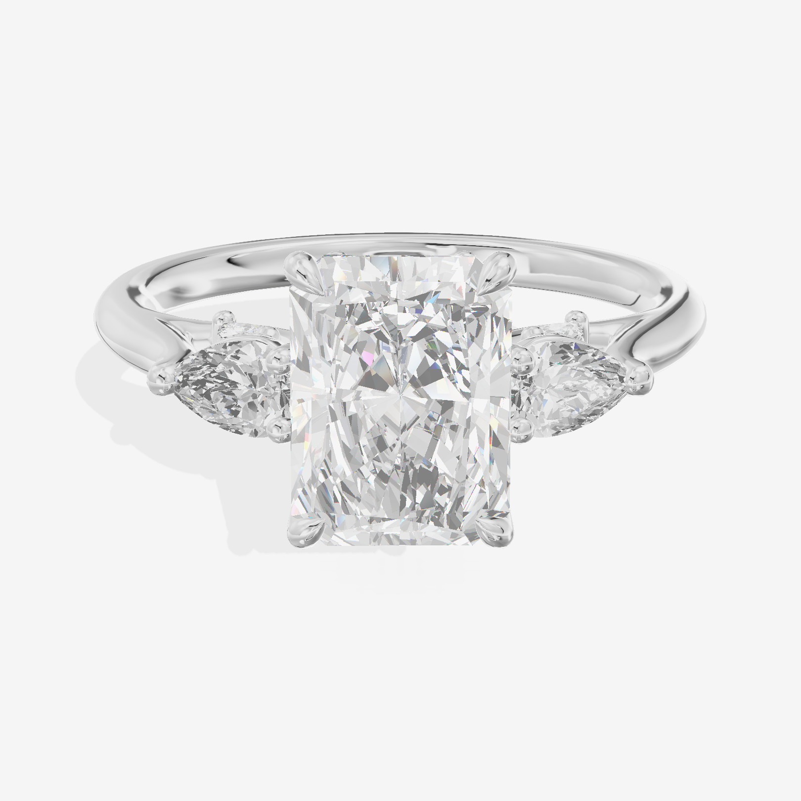 Classic Vowsae Three Stone Radiant Engagement Ring (3/5 ct. tw.) in Platinum