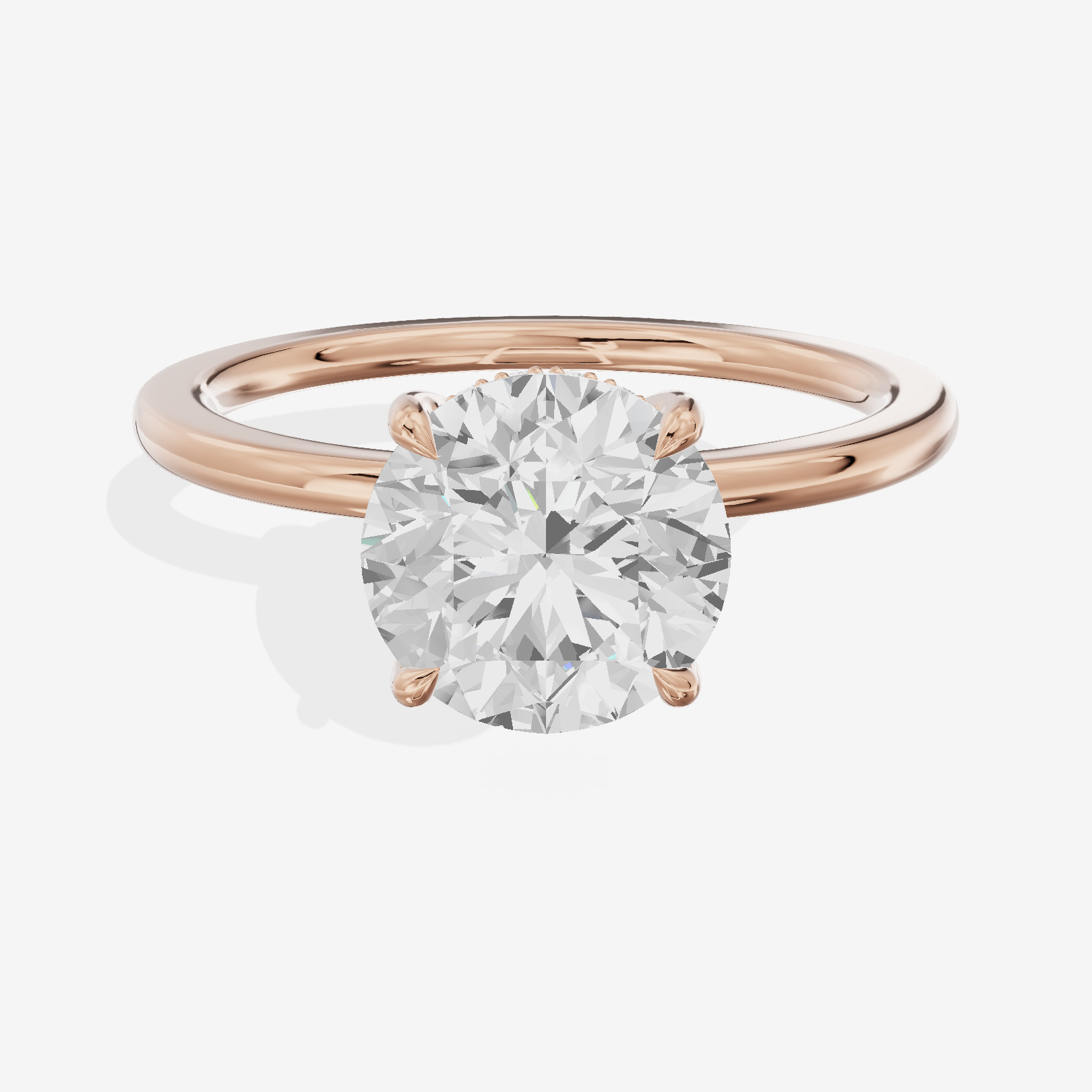 Coeurine Hidden Halo Round Engagement Ring (1/20 ct. tw.) in 18K Rose Gold