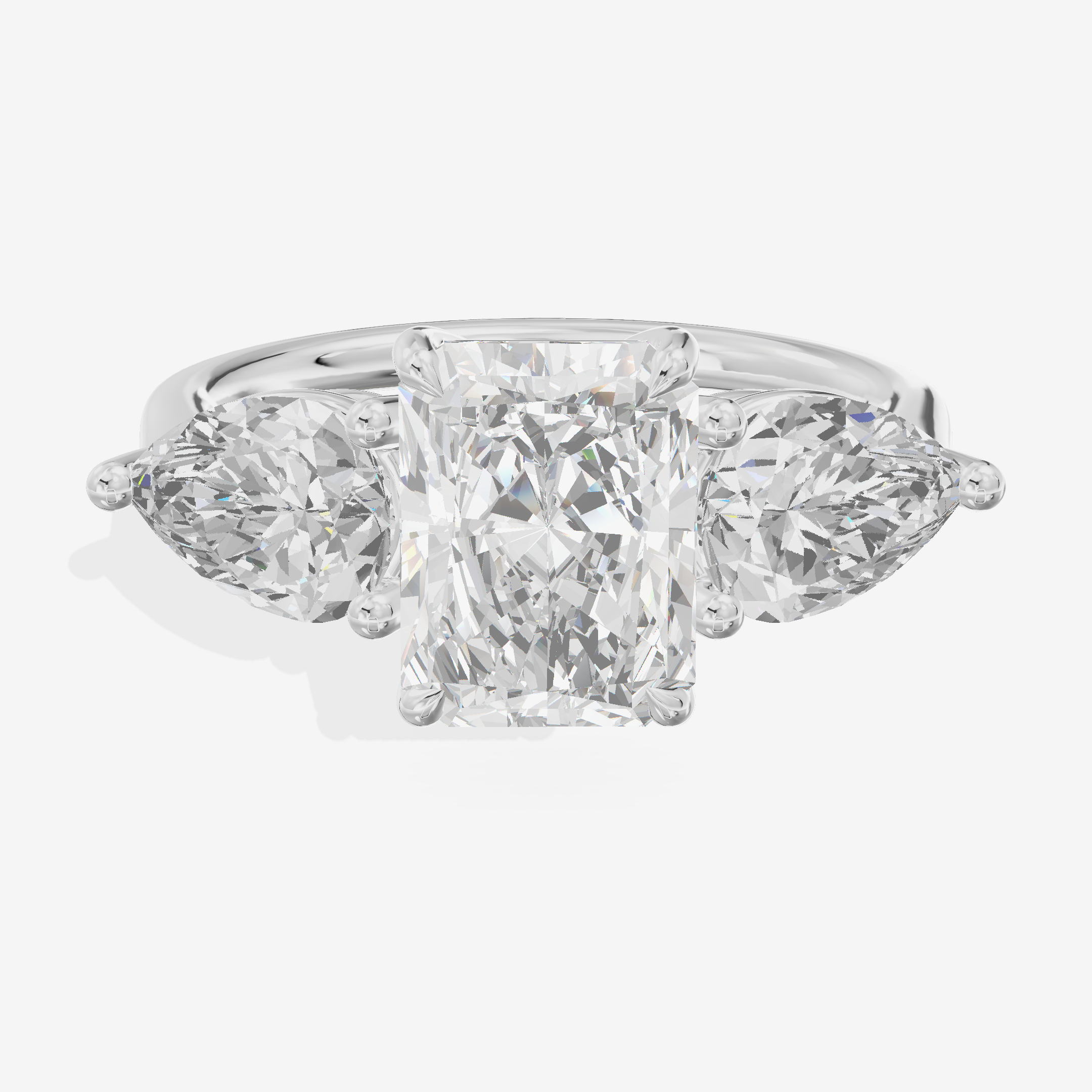 Luxe Heartline Three Stone Radiant Engagement Ring (3/4 ct. tw.) in 18K White Gold