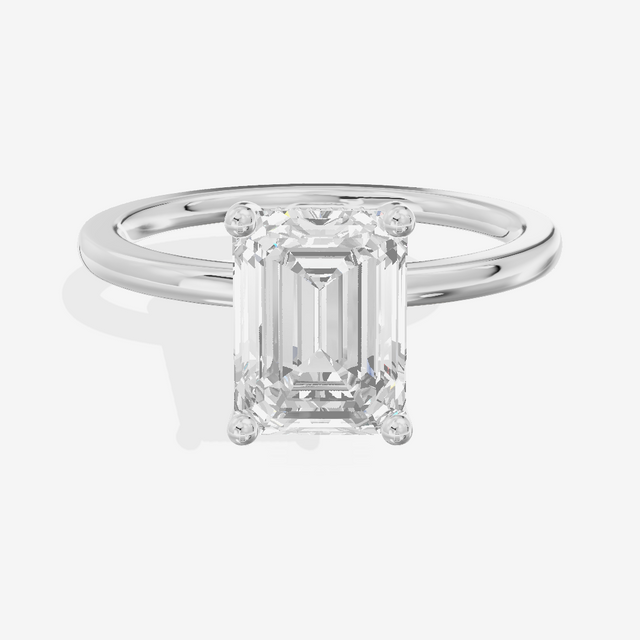 Vowsae Hidden Halo Emerald Engagement Ring (1/20 ct. tw.) in Platinum