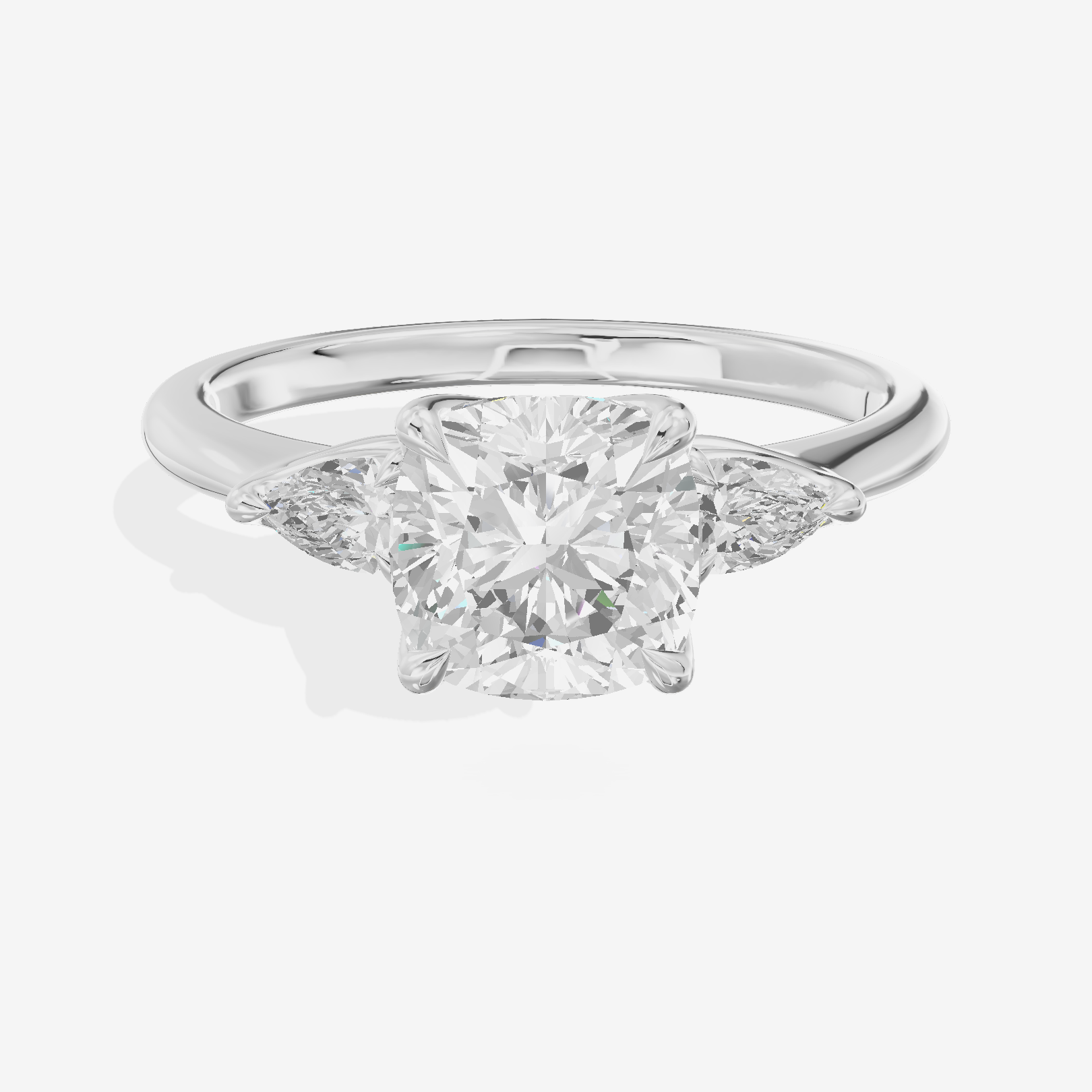 Petite Coeurine Three Stone Cushion Engagement Ring (1/5 ct. tw.) in Platinum