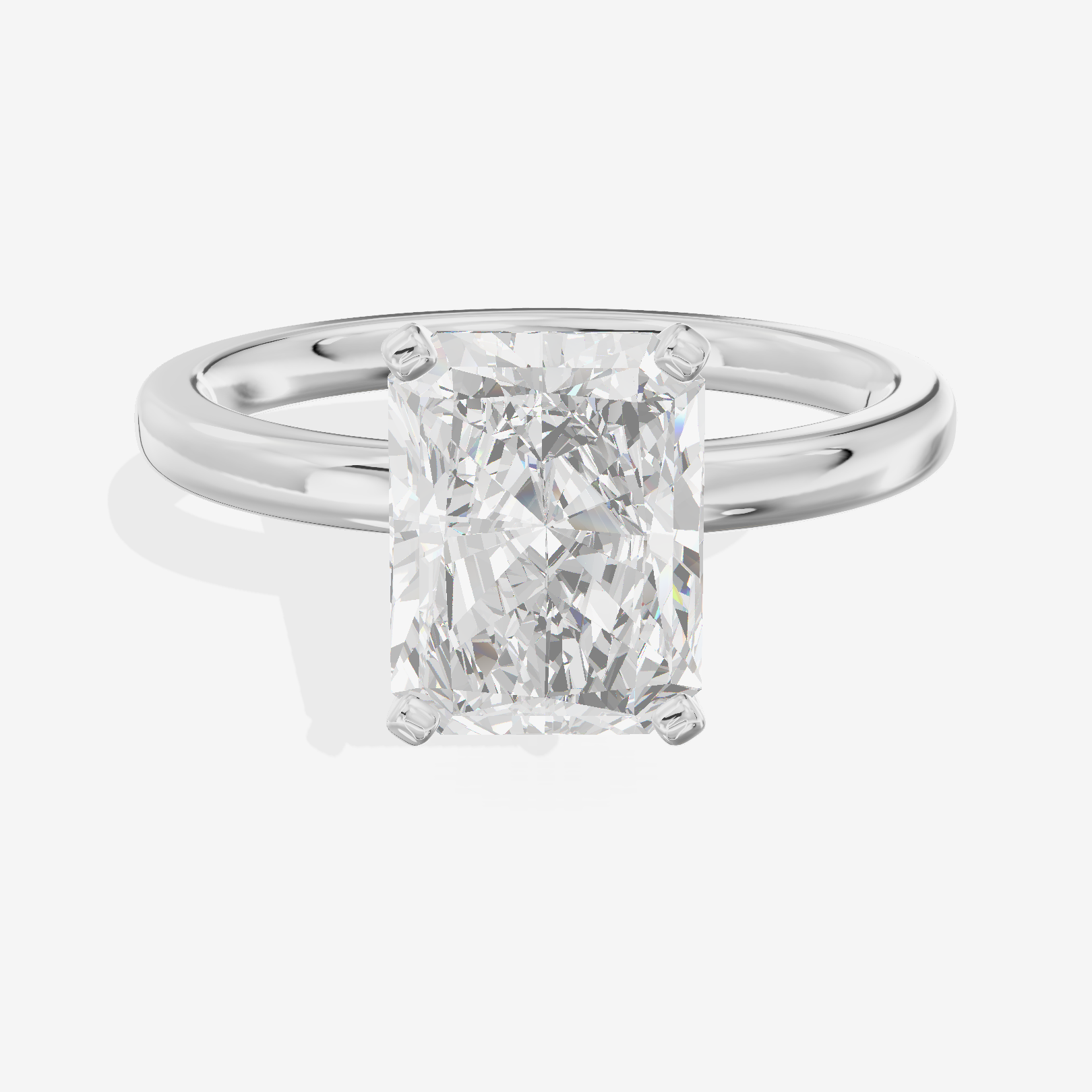 Sincere 2mm Radiant Solitaire Engagement Ring in 18K White Gold