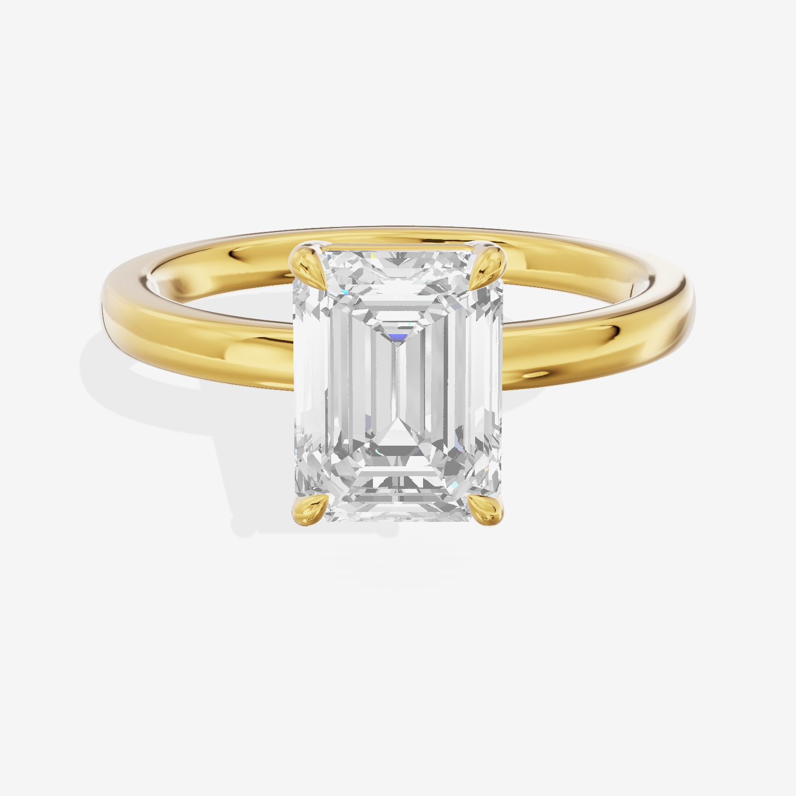 Heartline 2mm Emerald Solitaire Engagement Ring in 18K Yellow Gold