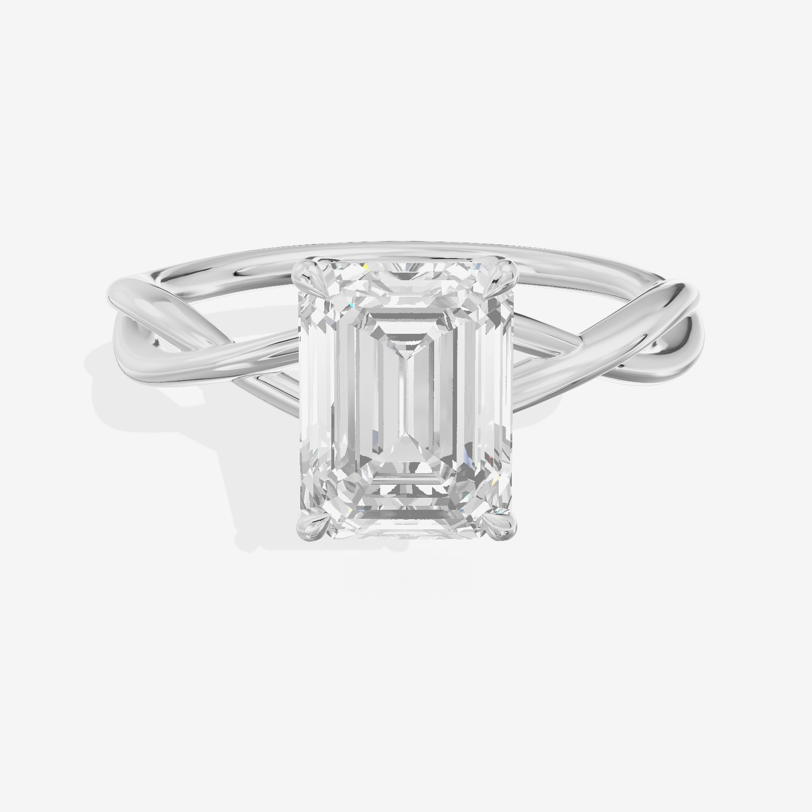Twined Sincere Emerald Twisted Engagement Ring in Platinum