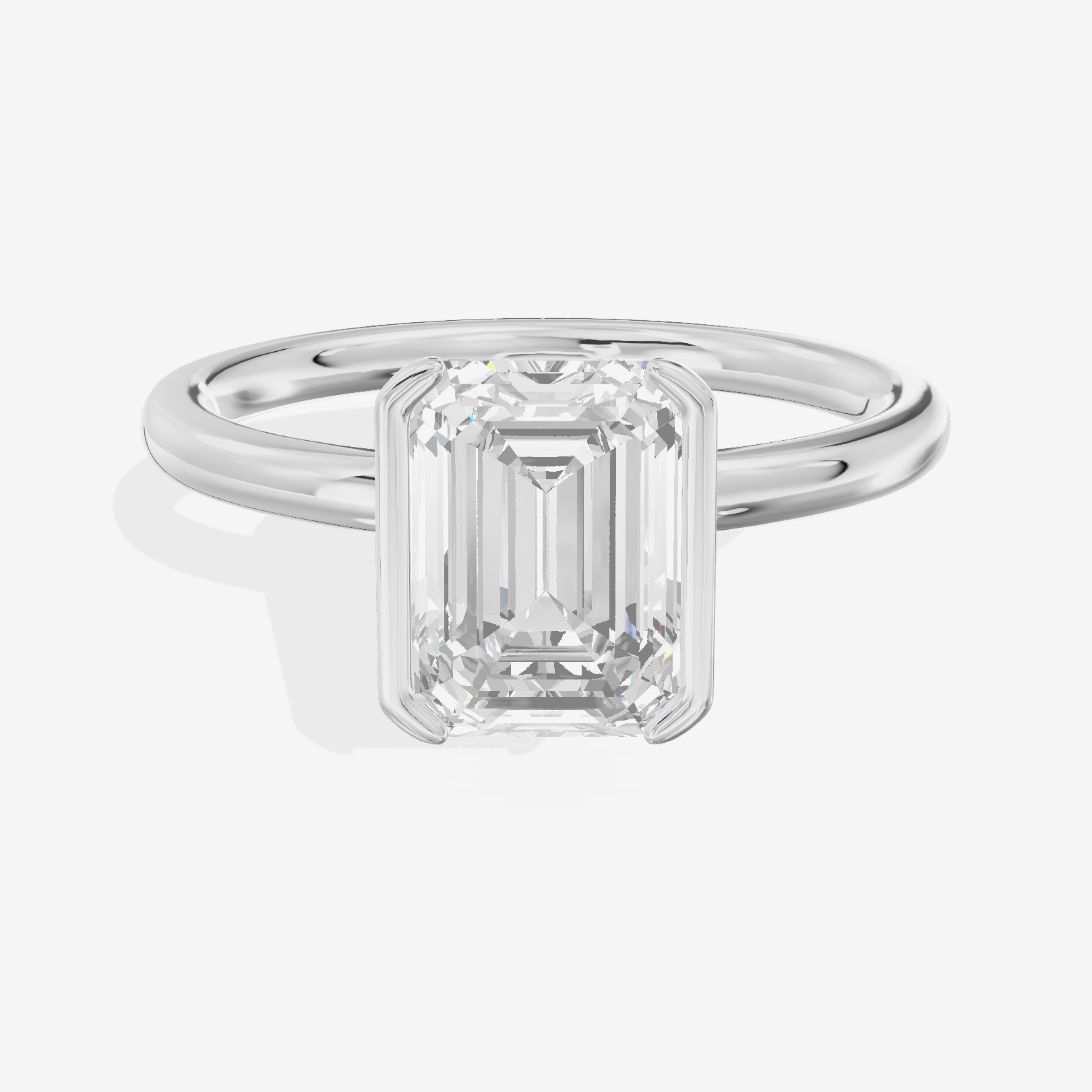 Sincere Bezel 1.8mm Emerald Solitaire Engagement Ring in 18K White Gold