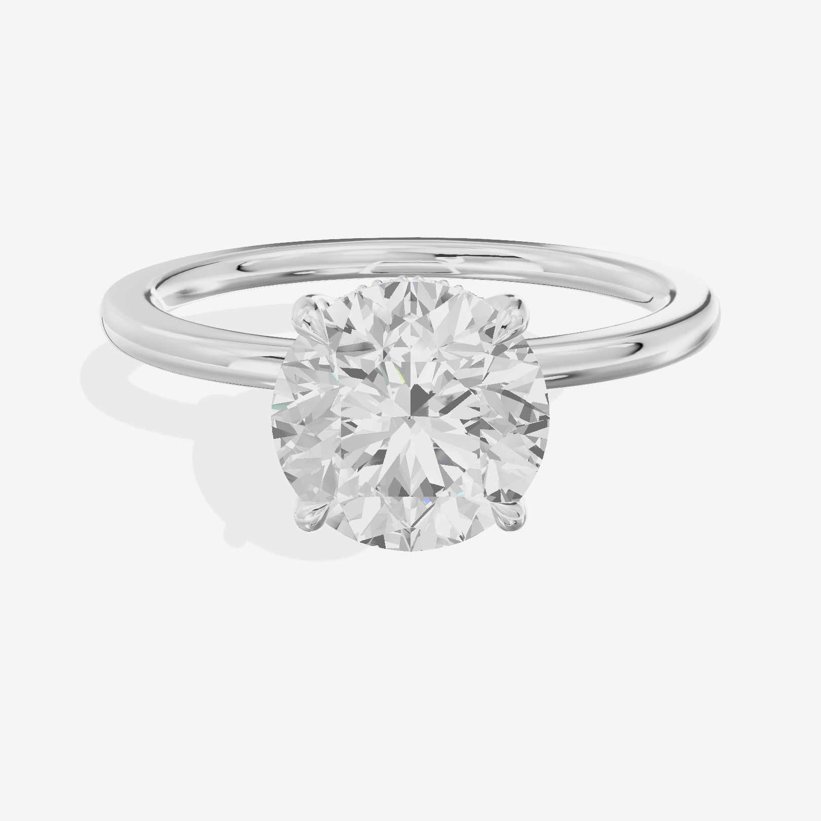Coeurine Hidden Halo Round Engagement Ring (1/20 ct. tw.) in 18K White Gold