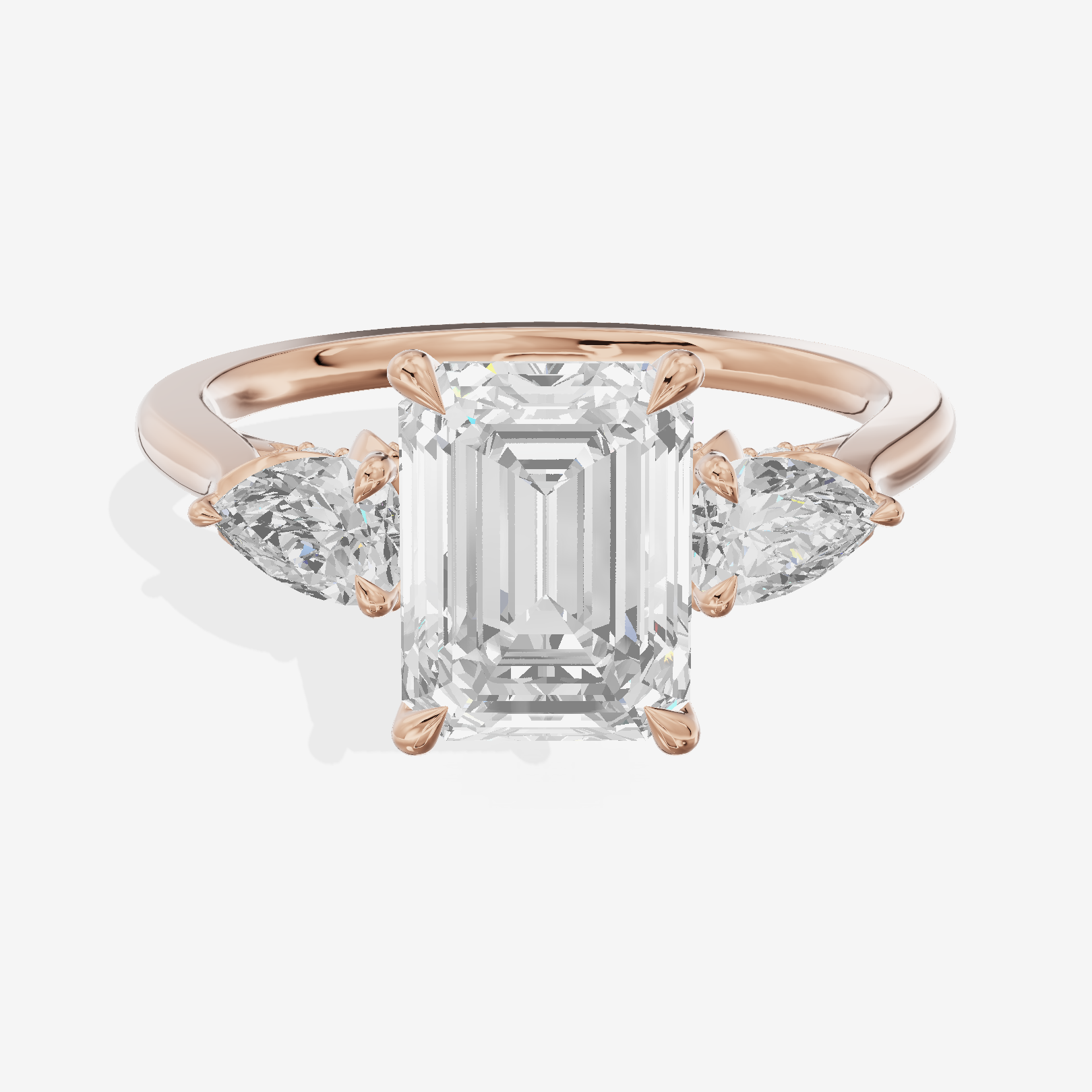 Modern Sincere Three Stone Emerald Engagement Ring (1/2 ct. tw.) in 14K Rose Gold