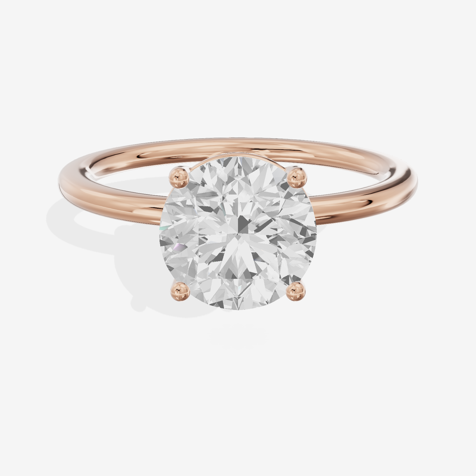 Crowned Vowsae 1.5mm Round Solitaire Engagement Ring in 14K Rose Gold