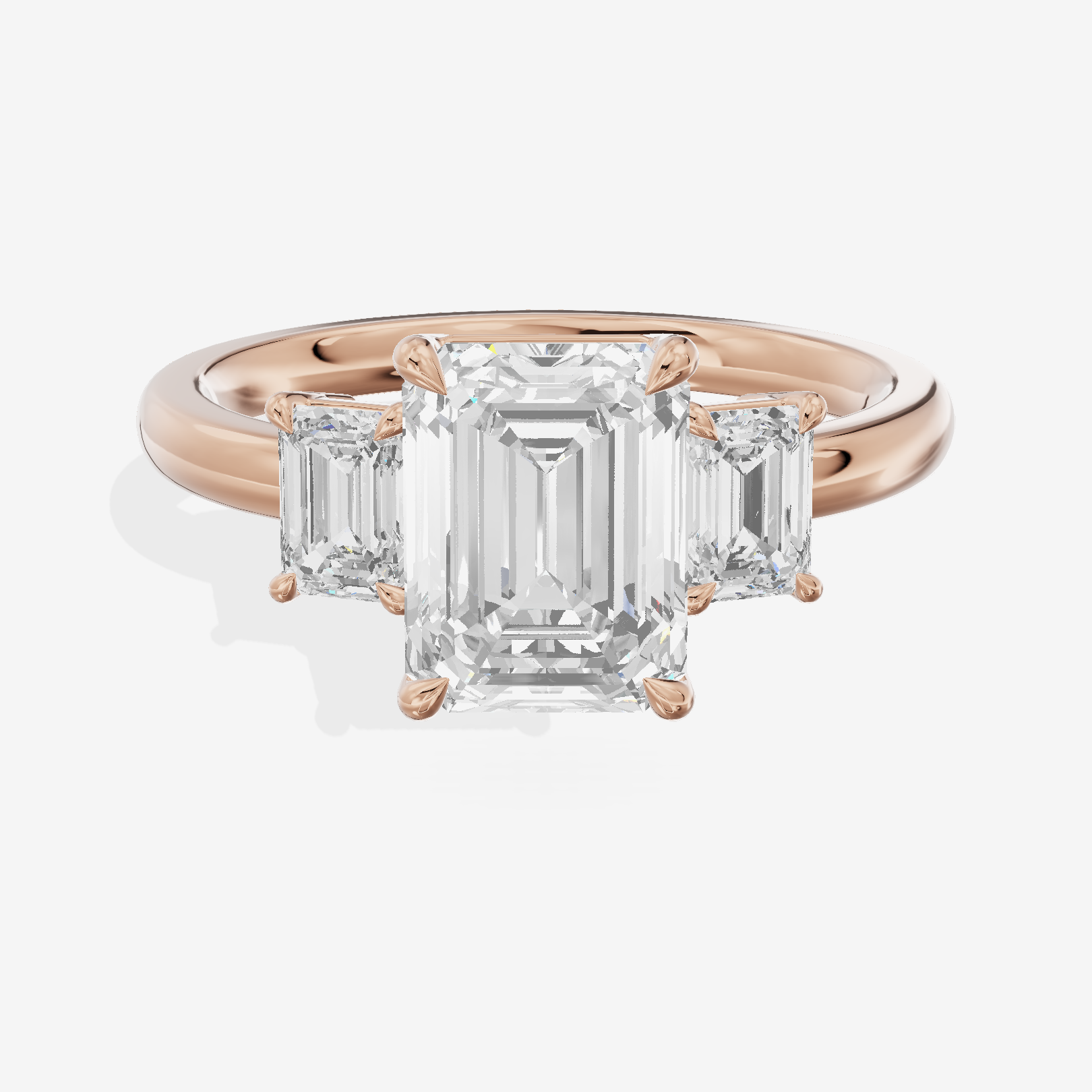 Petite Coeurine Three Stone Emerald Engagement Ring (1/5 ct. tw.) in 14K Rose Gold