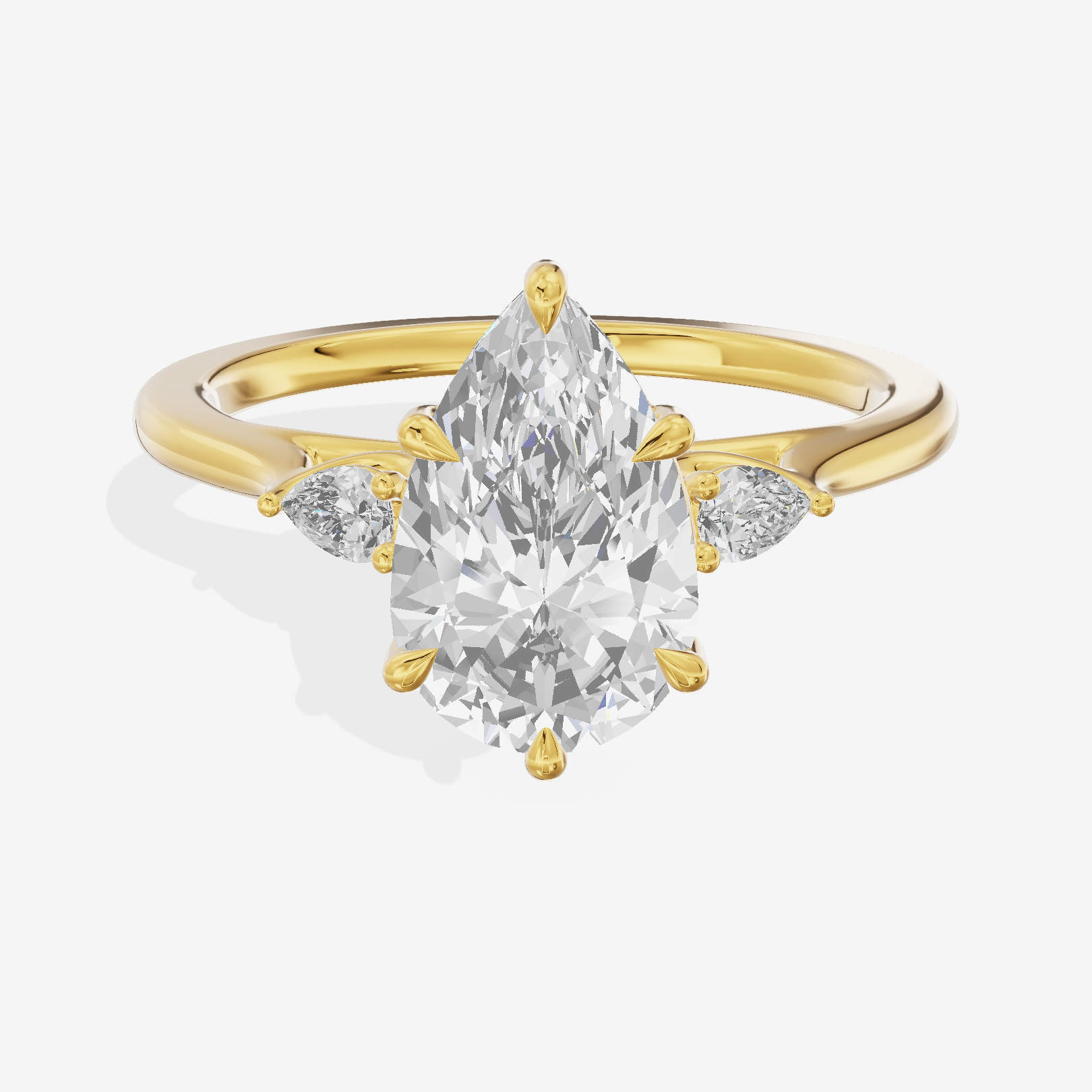 Triade Pear Three Stone Engagement Ring (1/10 ct. tw.) in 14K Yellow Gold