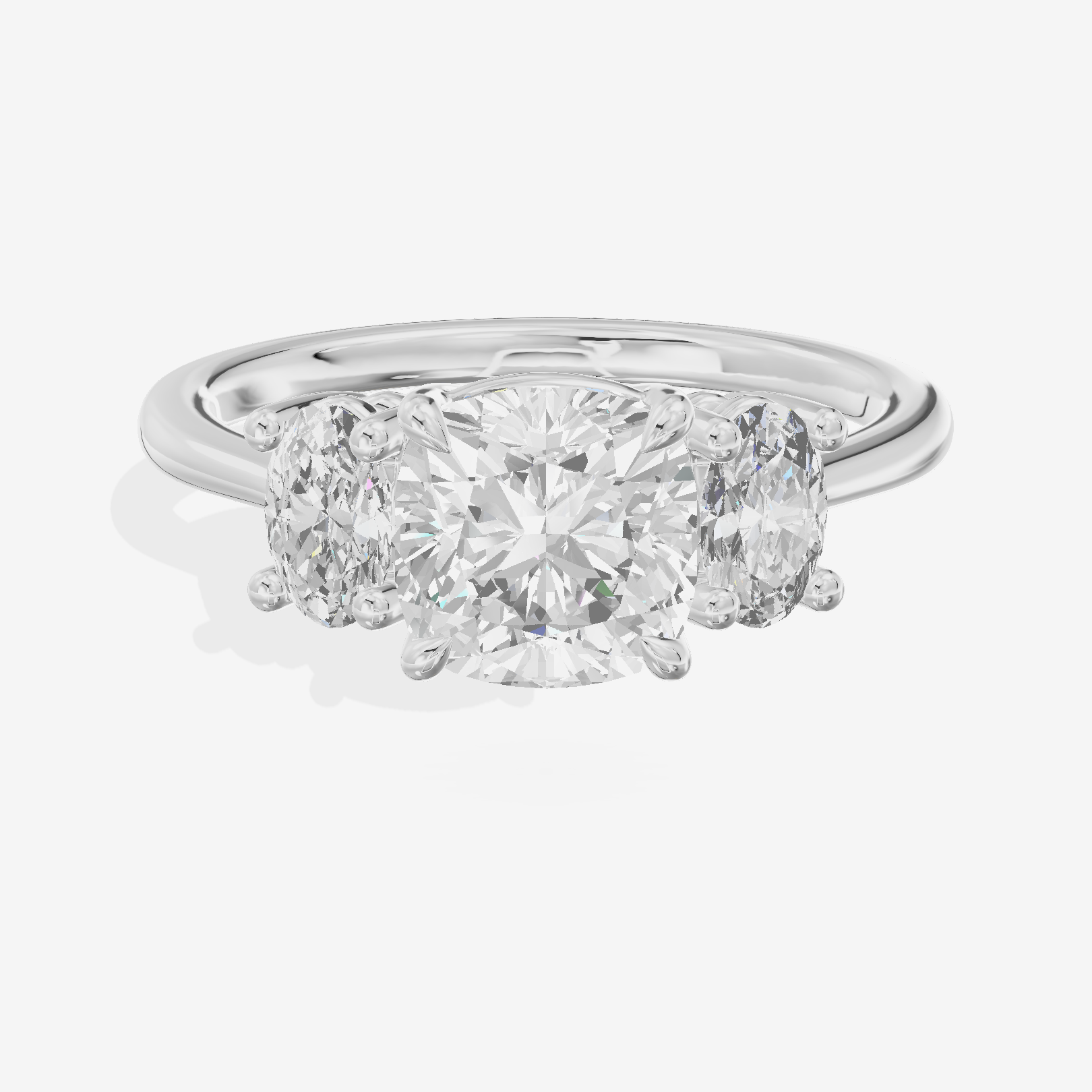 Modern Coeurine Three Stone Cushion Engagement Ring (1/2 ct. tw.) in Platinum