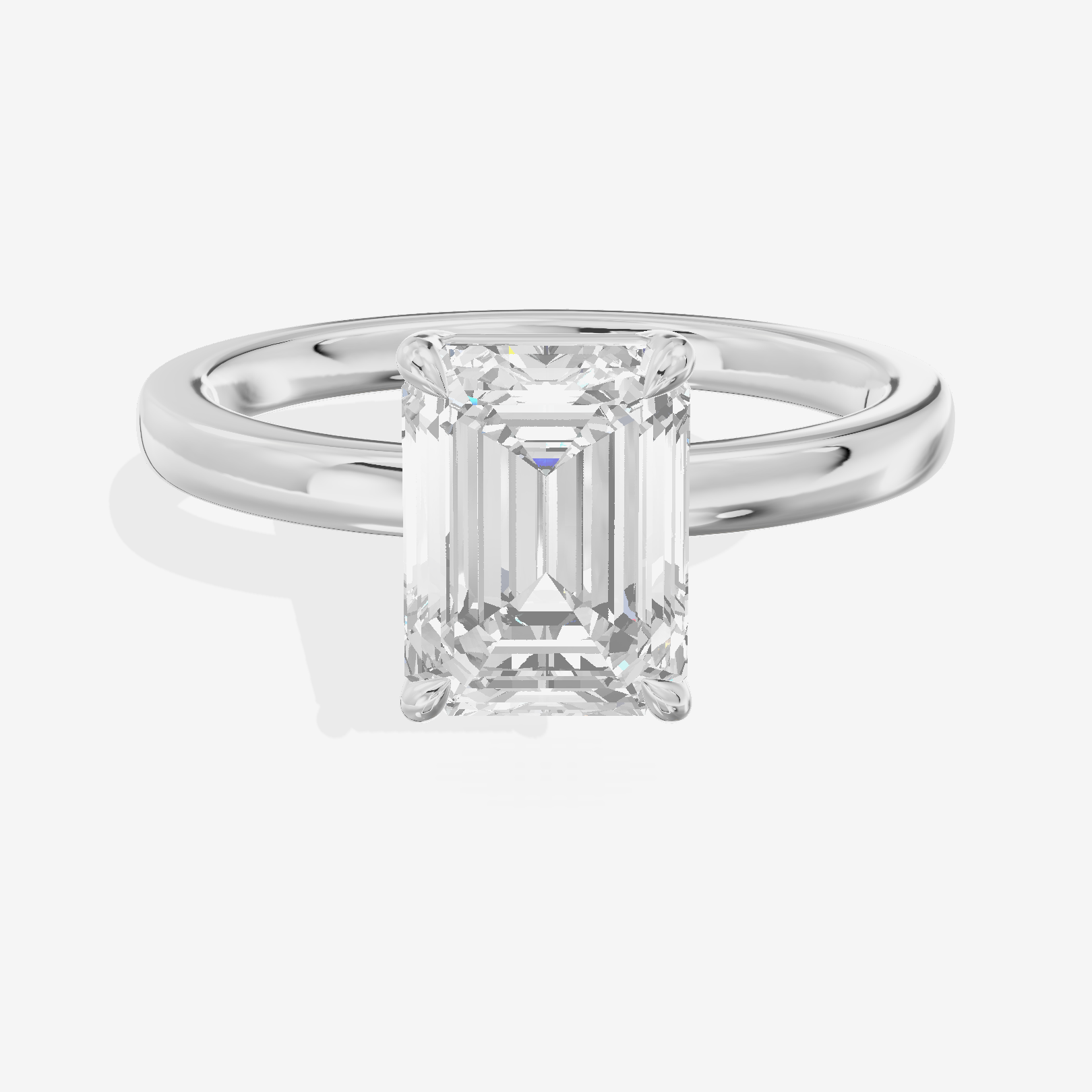 Heartline 2mm Emerald Solitaire Engagement Ring in Platinum