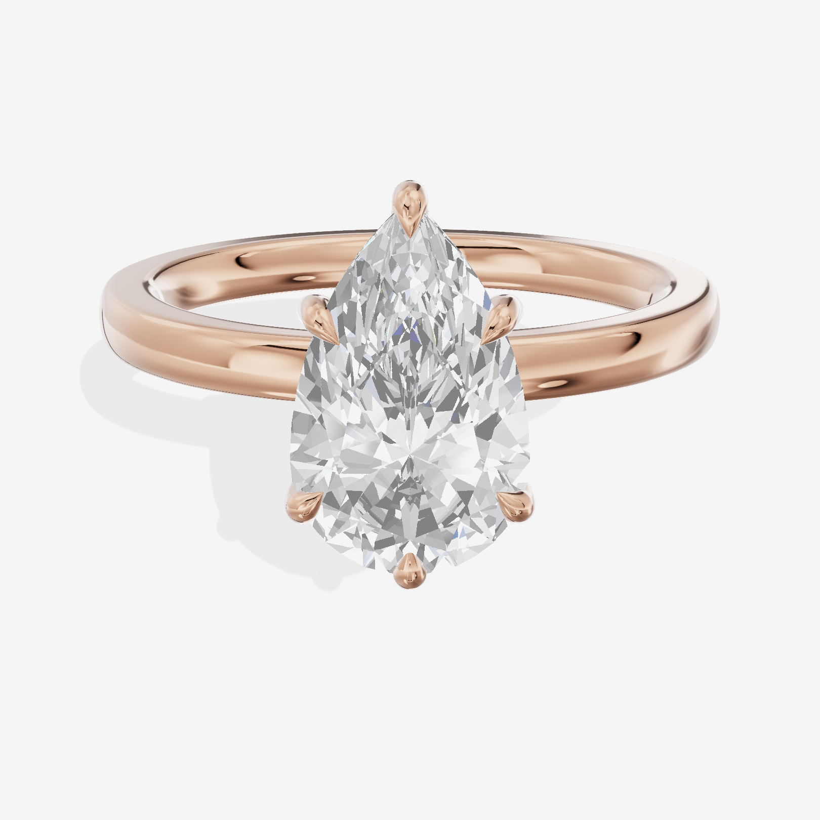 Crowned Whisper Pear Hidden Halo Engagement Ring in 14K Rose Gold