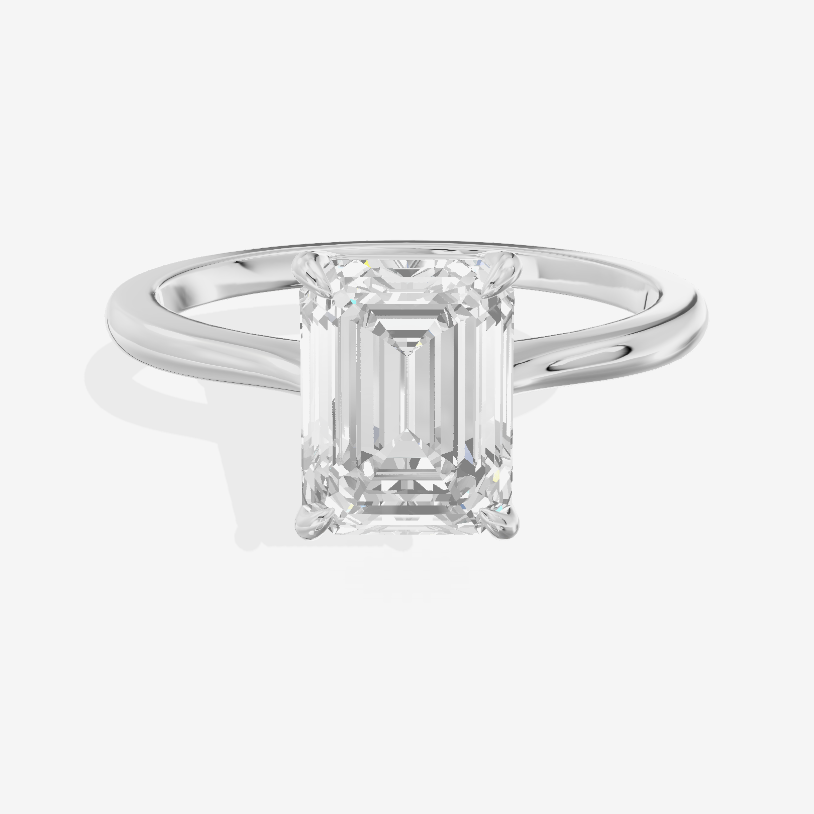 Bowed Adorae 1.5mm Emerald Solitaire Engagement Ring in Platinum