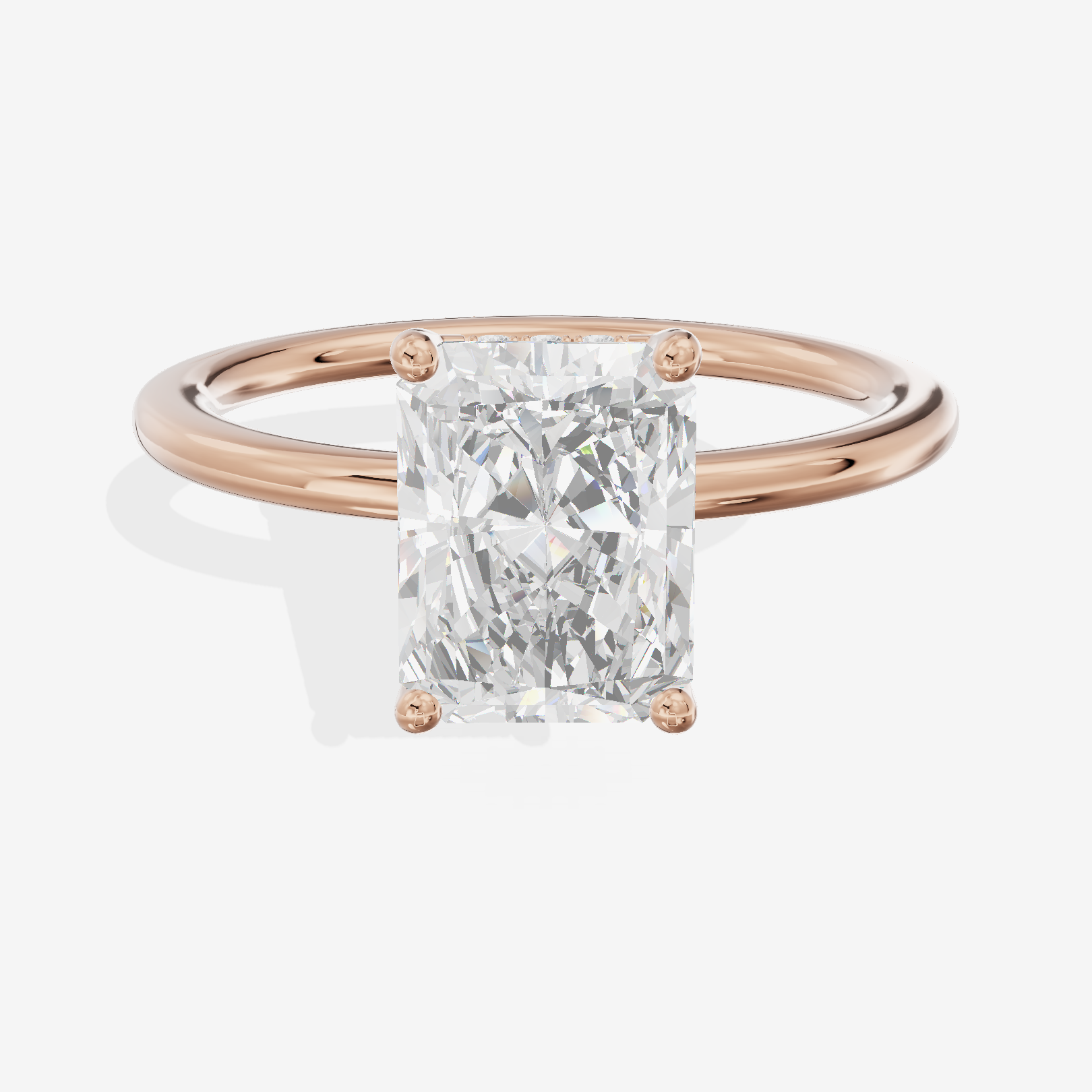 Reverya Hidden Halo Radiant Engagement Ring (1/20 ct. tw.) in 14K Rose Gold