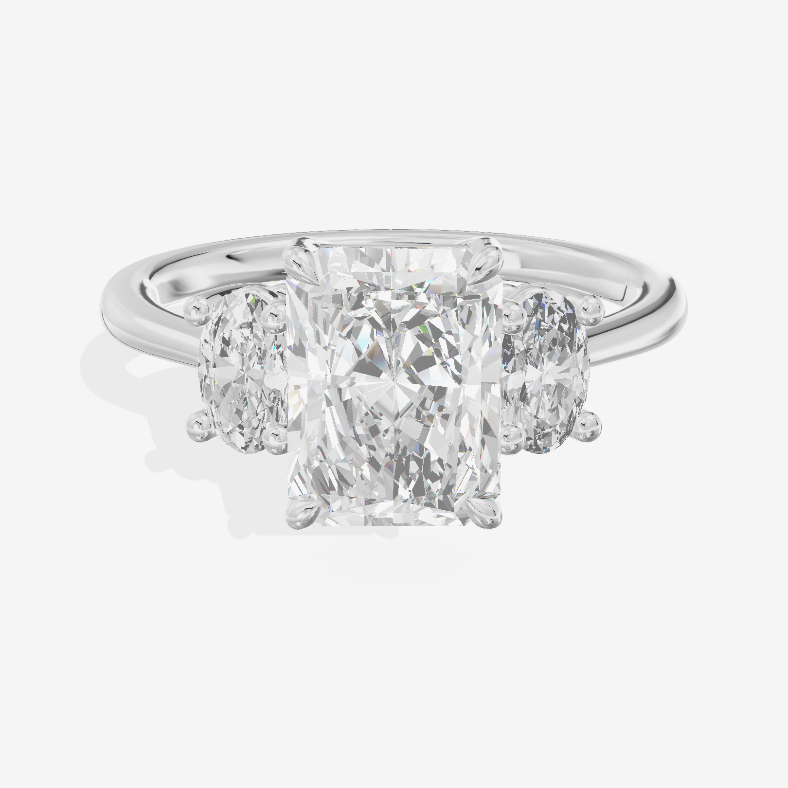 Modern Coeurine Three Stone Radiant Engagement Ring (1/2 ct. tw.) in 18K White Gold