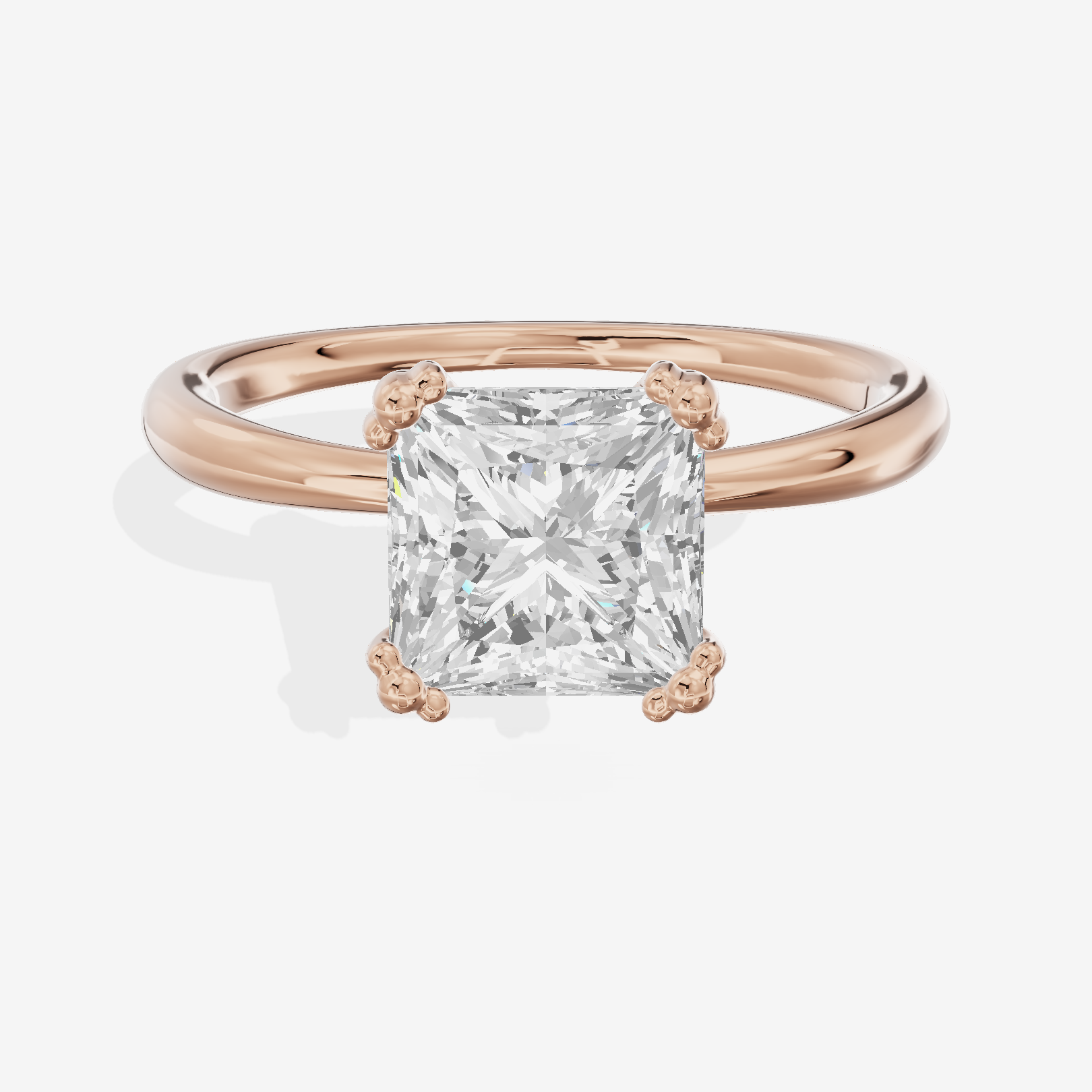 Classic Tender Princess Solitaire Engagement Ring in 14K Rose Gold