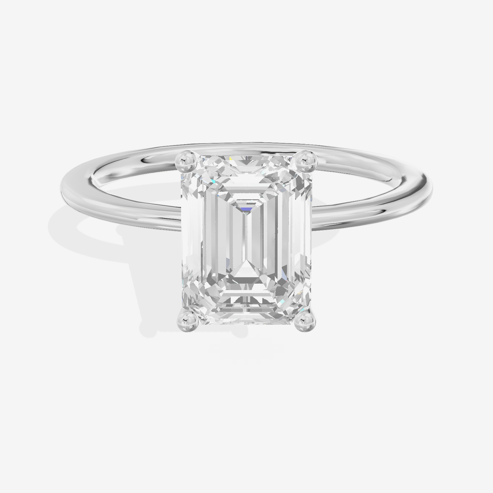 Whispered Promezza 1.4mm Emerald Solitaire Engagement Ring in 18K White Gold