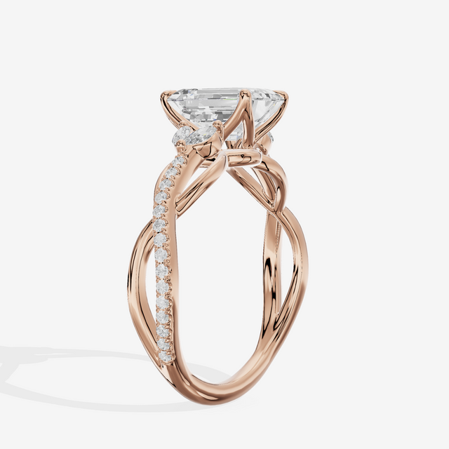 Lustrous Vowsae Emerald Engagement Ring with Side Stones (1/5 ct. tw.) in 14K Rose Gold