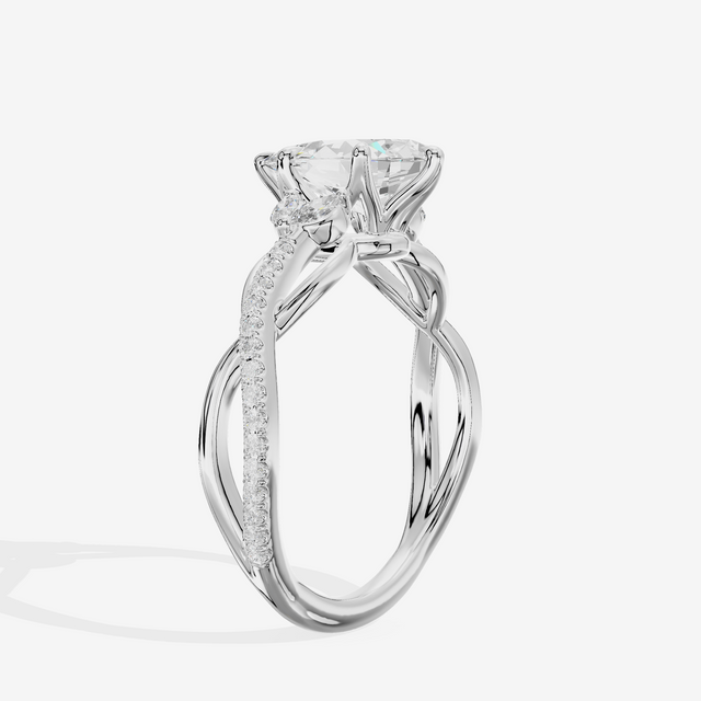 Lustrous Vowsae Pear Engagement Ring with Side Stones (1/5 ct. tw.) in 18K White Gold