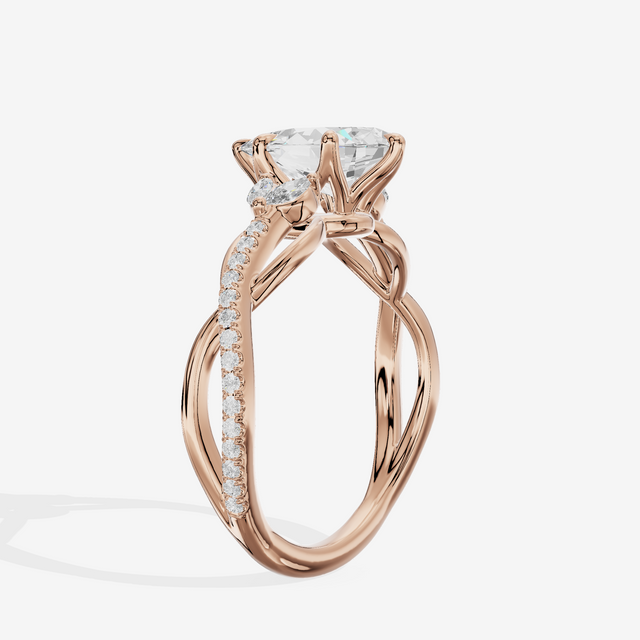 Lustrous Vowsae Pear Engagement Ring with Side Stones (1/5 ct. tw.) in 14K Rose Gold