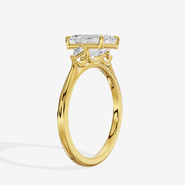 Petite Sincere Three Stone Emerald Engagement Ring (1/15 ct. tw.) in 14K Yellow Gold