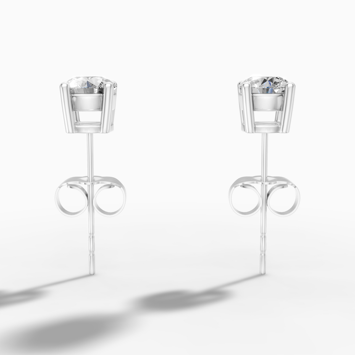 Timeless 4-Prong Diamond Stud Earrings — 0.60ct. tw. in 18K White Gold