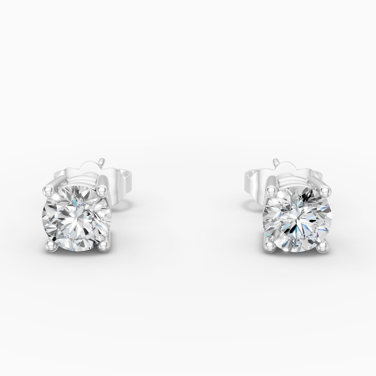 Timeless 4-Prong Diamond Stud Earrings — 0.60ct. tw. in 18K White Gold