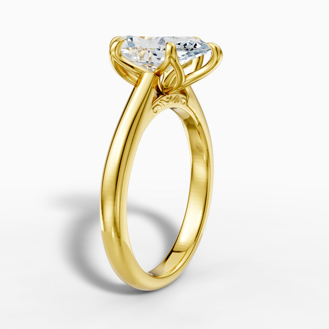 14K gold ring with a 2.5-carat pear-shaped, engraved lab-grown diamond