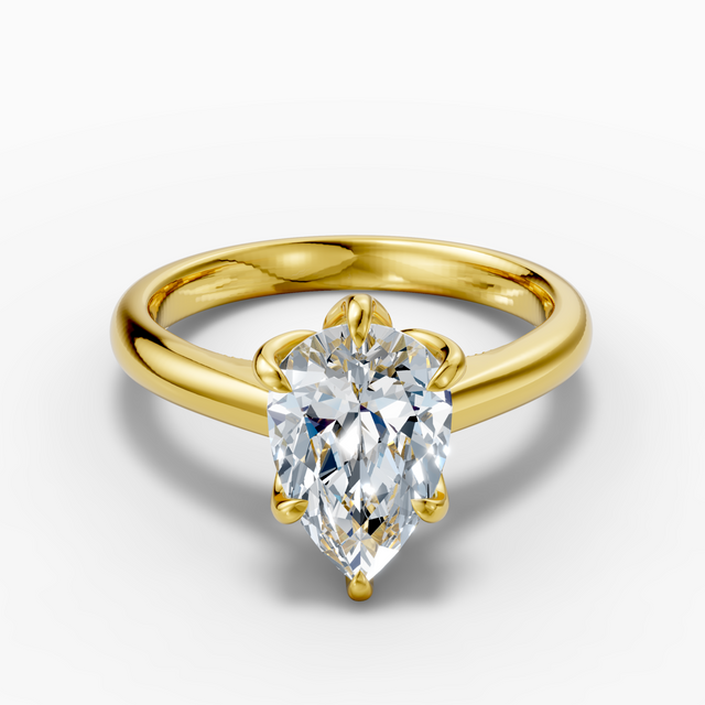 14K gold ring with a 2.5-carat pear-shaped, engraved lab-grown diamond